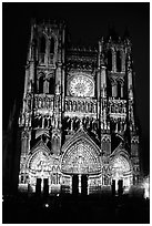 Cathedral facade laser-illuminated at night to recreate original colors, Amiens. France ( black and white)