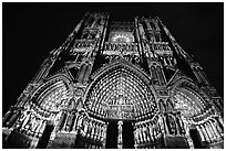Looking up Notre Dame Cathedral laser-illuminated to recreate original colors, Amiens. France (black and white)