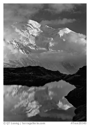 Mont Blanc and clouds reflected in pond, Chamonix. France (black and white)
