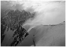 Alpinists on Aiguille du Midi ridge, Chamonix. France (black and white)