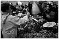 Shopping at the Fresh produce market, Saint Malo. Brittany, France (black and white)