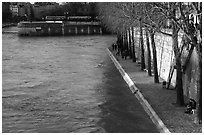 Walking on the banks of the Seine on the Saint-Louis island. Paris, France ( black and white)