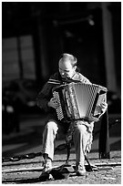 Accordeon player on the street. Paris, France ( black and white)
