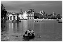 Rowers and Fontainebleau palace. France ( black and white)