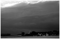 Stormy skies and village. France ( black and white)
