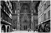 Facade of the Notre Dame cathedral seen from nearby street. Strasbourg, Alsace, France ( black and white)
