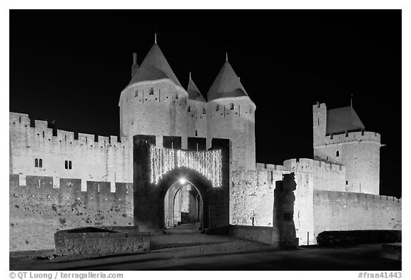 Medieval city and main entrance by night. Carcassonne, France
