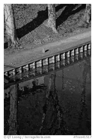 Footpath and reflections, Canal du Midi. Carcassonne, France (black and white)