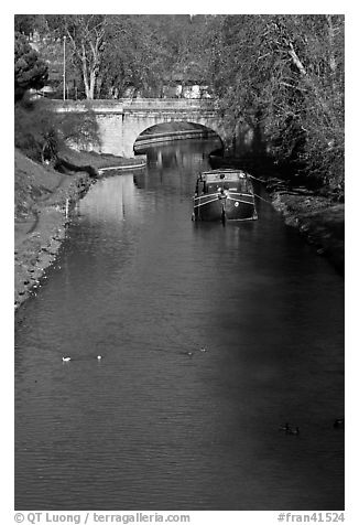 Ducks, barge and bridge, Canal du Midi. Carcassonne, France (black and white)