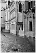 Pavement and buildings, Place St Andre. Grenoble, France (black and white)