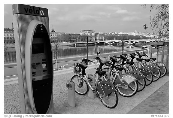 Bicycles for rent with automated kiosk checkout. Lyon, France