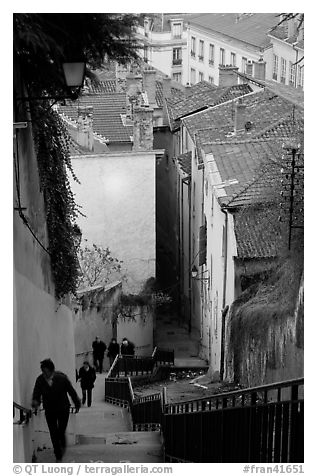 People climbing stairs to Fourviere Hill. Lyon, France (black and white)