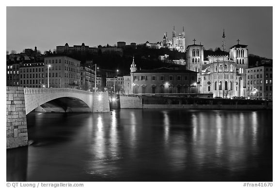 Napoleon Bridge, Saone River and Fourviere Hill at night. Lyon, France (black and white)