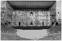 Tiered seats, orchestra, stage, and stage roof, Roman theater. Provence, France (black and white)