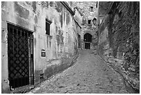 Narrow street, Les Baux-de-Provence. Provence, France ( black and white)