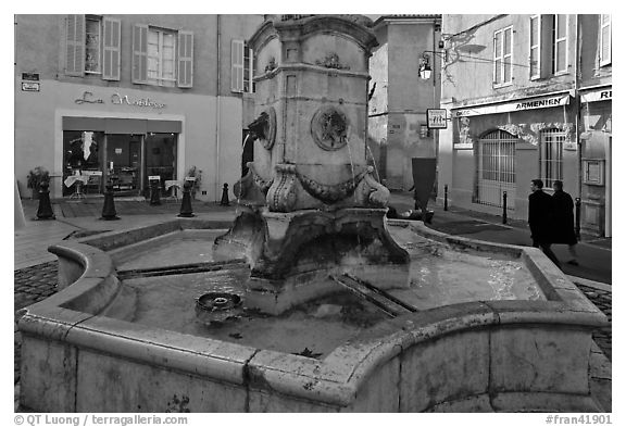 Fountain in old town plaza. Aix-en-Provence, France (black and white)