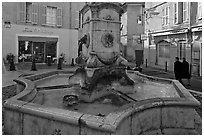 Fountain in old town plaza. Aix-en-Provence, France ( black and white)