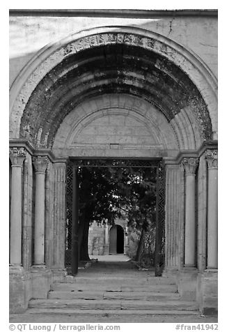 Gate of St Honoratus church, Alyscamps. Arles, Provence, France (black and white)