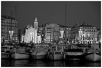 Yachts, church, and city at night, Vieux Port. Marseille, France ( black and white)