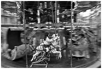 Girl on horse carousel. Avignon, Provence, France ( black and white)