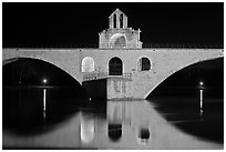 St Benezet Bridge with chapel of St Benezet at night. Avignon, Provence, France ( black and white)