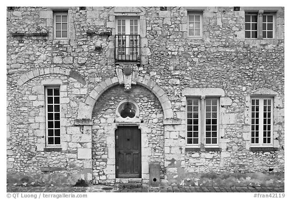 Facade of stone house, Provins. France (black and white)