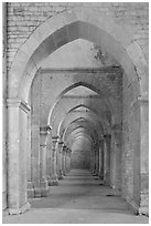 Row of arches, Abbaye de Fontenay. Burgundy, France (black and white)