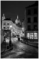 Street and Sacre-Coeur dome at night, Montmartre. Paris, France ( black and white)