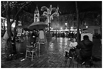 Place du Tertre by night with Christmas lights, Montmartre. Paris, France ( black and white)