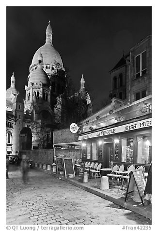 Sacre-Coeur basilica and restaurant by night, Montmartre. Paris, France