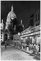 Sacre-Coeur basilica and restaurant by night, Montmartre. Paris, France (black and white)