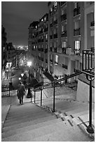 Woman on stairs by night, Montmartre. Paris, France ( black and white)