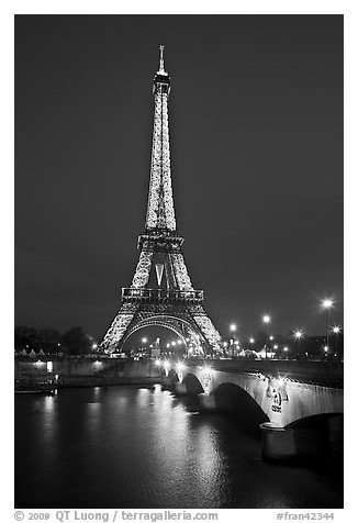 Seine River, Iena Bridge, and illuminated Eiffel Tower. Paris, France (black and white)