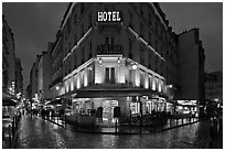 Hotel and pedestrian streets at night. Quartier Latin, Paris, France ( black and white)