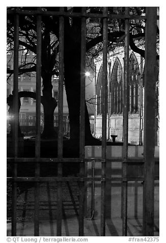 Cluny thermes behind iron grids by night. Quartier Latin, Paris, France