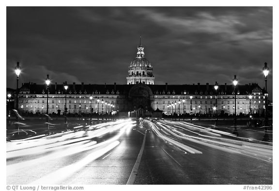 Les Invalides hospital and chapel dome with light trails from traffic. Paris, France (black and white)
