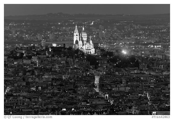 Montmartre Hill and Sacre-Coeur basilica at night. Paris, France (black and white)