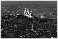 Montmartre Hill and Sacre-Coeur basilica at night. Paris, France ( black and white)