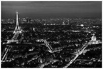 Aerial view at night with Eiffel Tower, Invalides, and Arc de Triomphe. Paris, France (black and white)