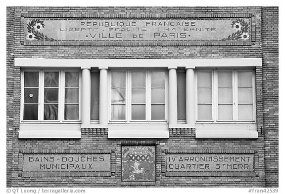 Facade of historic public baths. Paris, France (black and white)