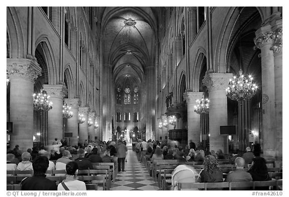 Interior of Notre-Dame de Paris during mass. Paris, France