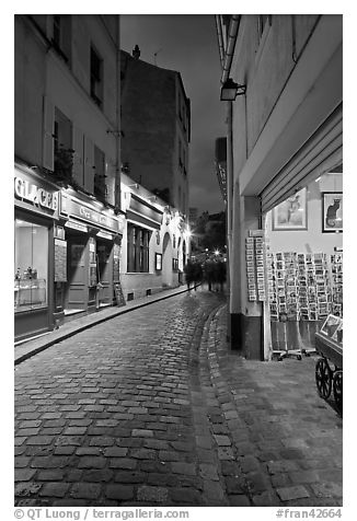Pedestrian cobblestone street and tourist business, Montmartre. Paris, France