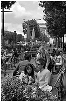 Couple at outdoor cafe on the Champs-Elysees. Paris, France ( black and white)