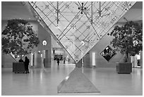 Inverted pyramid and shopping mall under the Louvre. Paris, France ( black and white)