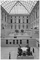 Tourists in the Louvre museum. Paris, France (black and white)