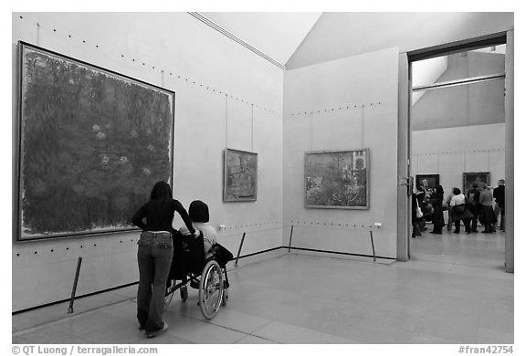 Tourist in wheelchair, Orsay Museum. Paris, France