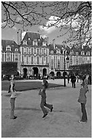Girls playing with rope, Place des Vosges. Paris, France ( black and white)