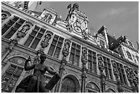 Statue Science by Jules Blanchard and Hotel de Ville at sunset. Paris, France ( black and white)