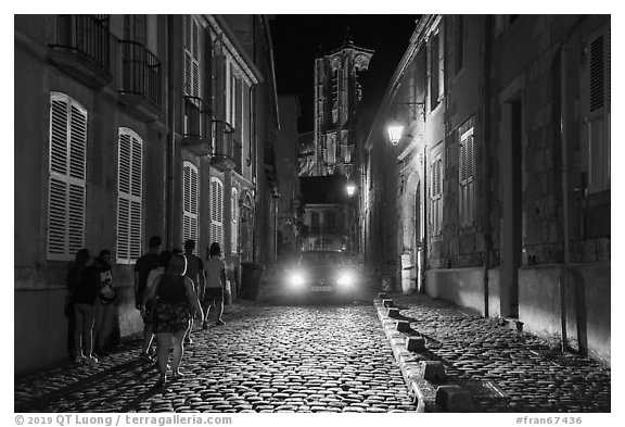 Blue lights in the streets and Saint-Etienne Cathedral. Bourges, Berry, France (black and white)