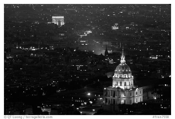 Aerial view of Arc de Triomphe and Invalides by night. Paris, France